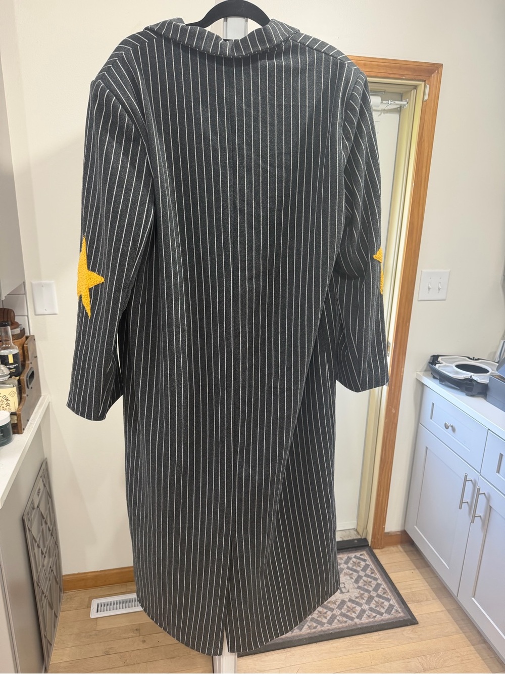 Dressed in Lala Long Pinstripe Coat with Yellow Star Elbow Detail - Women - Picture 7 of 10